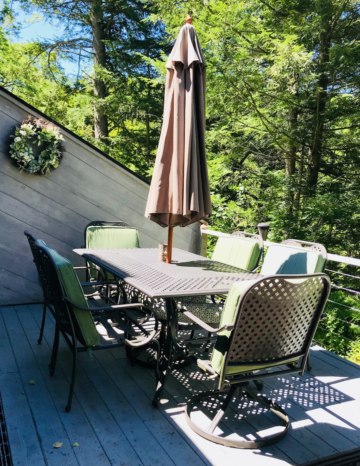 Falcon House deck with dining and BBQ